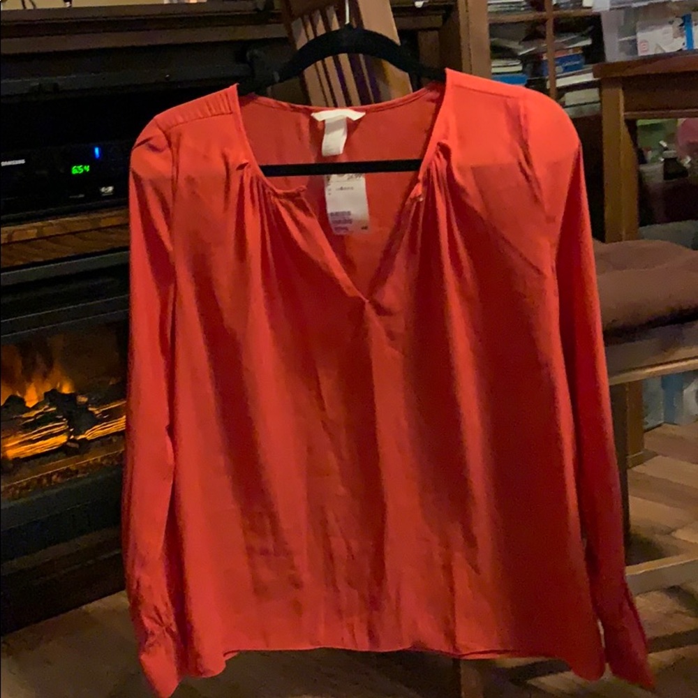 H&M’s orange blouse